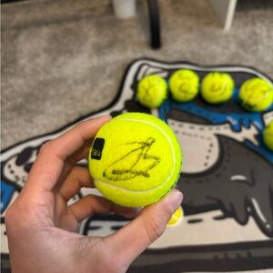 Jannik sinner and carlos alcaraz autog tennis balls